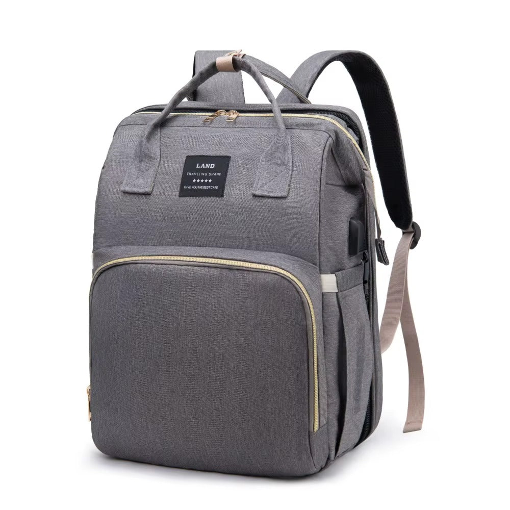 MommyGo™ Portable Baby Diaper Bag with Foldable Crib – Large Capacity Travel Backpack for Modern Moms